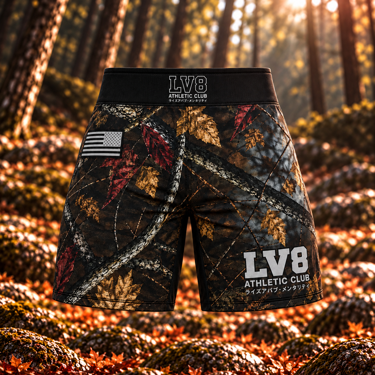 Front view of women's LV8 Woods shorts with woodland camouflage, a black LV8 waistband, monochrome American flag, and gray leg branding.