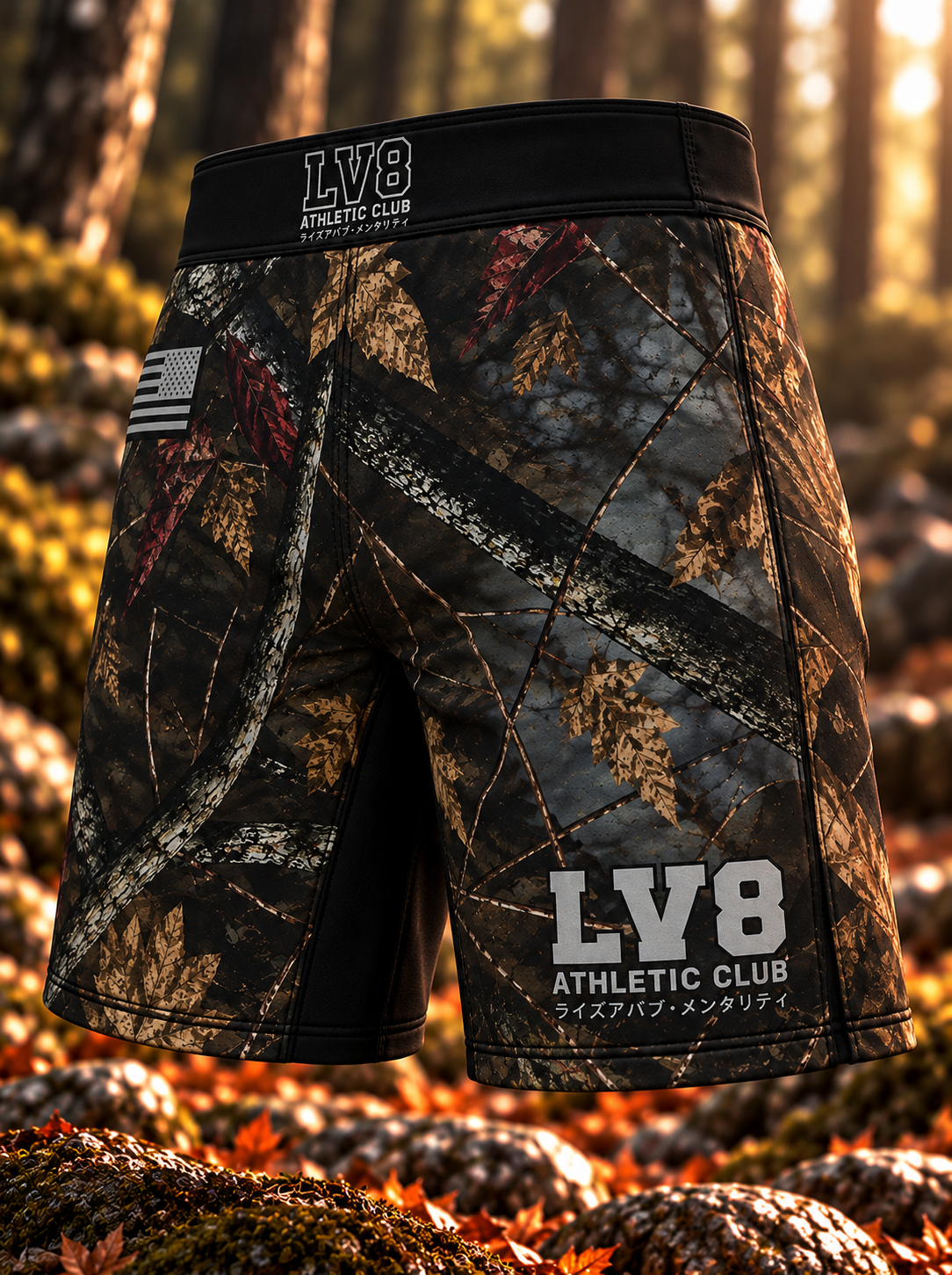 Angled front view of men's LV8 Woods shorts showing woodland camouflage, leg logo, waistband branding, and a black inner-leg panel.